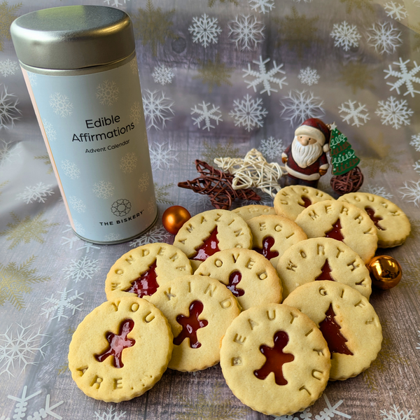 12 Days of Christmas tin next to a stack of Christmas cookies