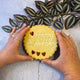 Giant cookies | Happy Anniversary cookie with "Happy Anniversary" in icing and three heart-shaped jam cut-outs.