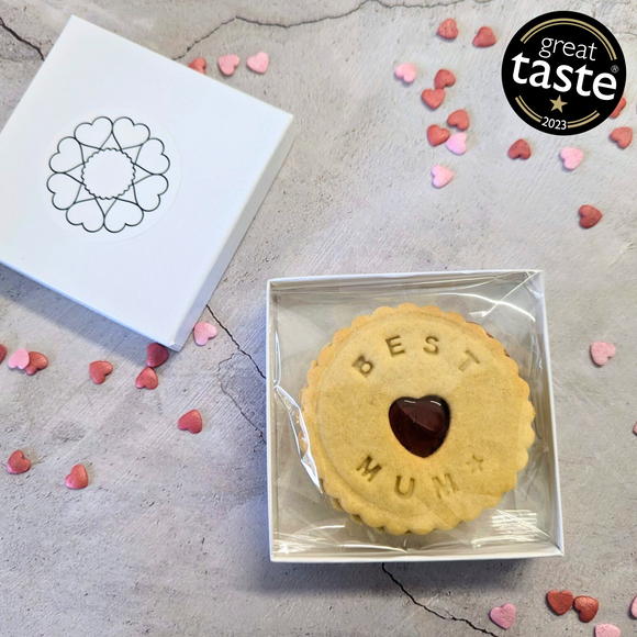 A beautifully presented "Best Mum" biscuit in a white gift box with a heart-shaped jam centre. Perfect for showing your mum some love on Mother's Day! 