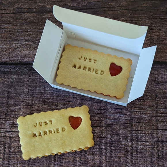 Wedding Jam Biscuit with "Just Married" embossed and a heart-shaped jam centre. 