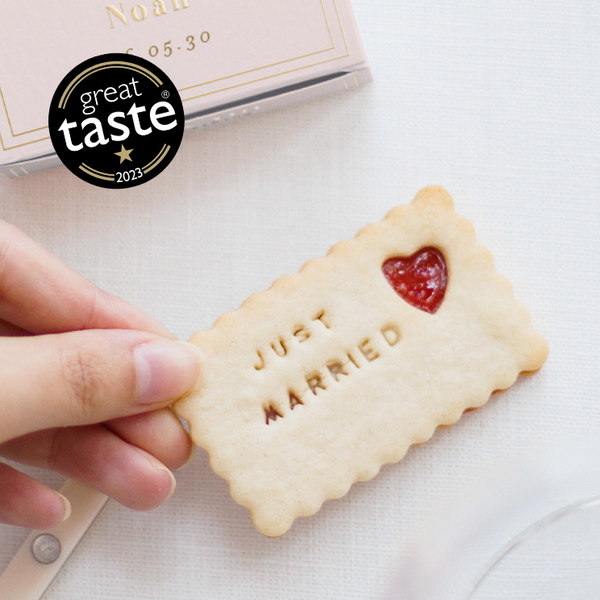 Wedding Jam Biscuit with "Just Married" embossed and a heart-shaped jam centre. A Great Taste 2023 award logo is visible.